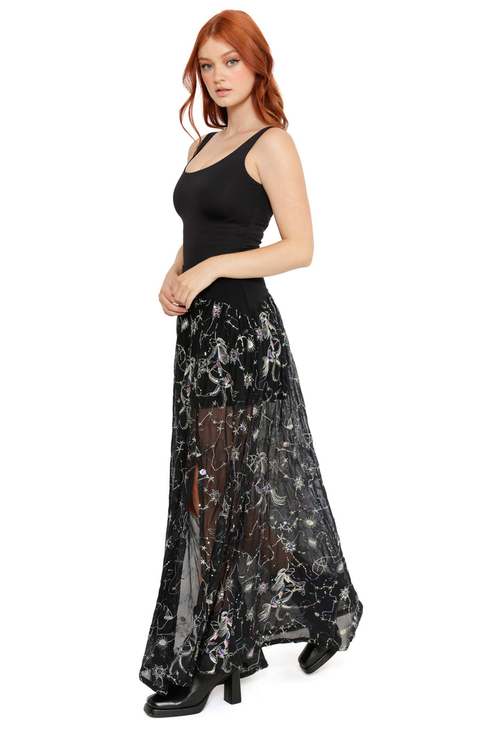 Celestial print mesh maxi skirt featuring embroidered stars, moons and cosmic linework on black fabric