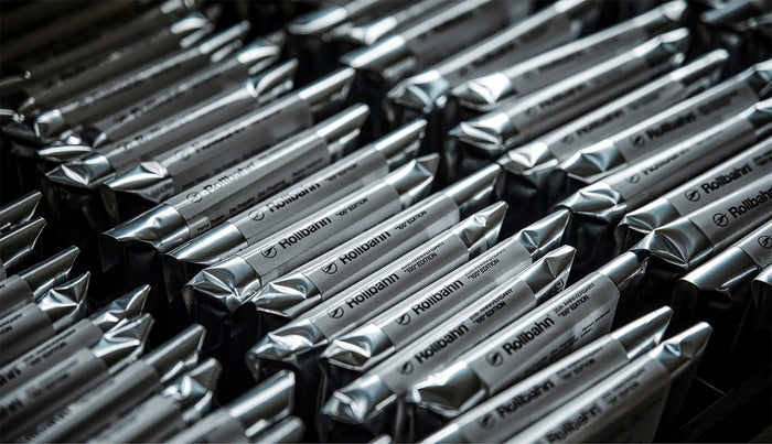 Foil-wrapped Rollbahn mini memo blind box items stacked closely together