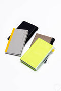 EDiT B7 storage grid notebook, neon yellow cover with elastic; also dark black