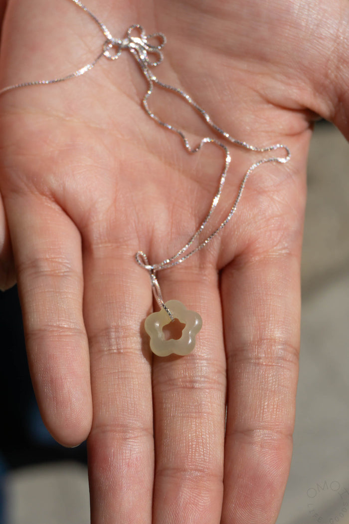 Jade flower pendant sterling silver necklace with chain, worn on hand