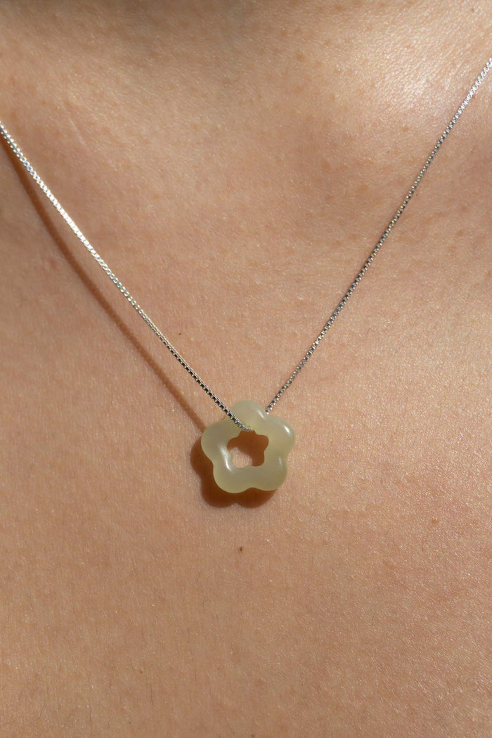 Jade flower sterling silver necklace with small clover-like pendant