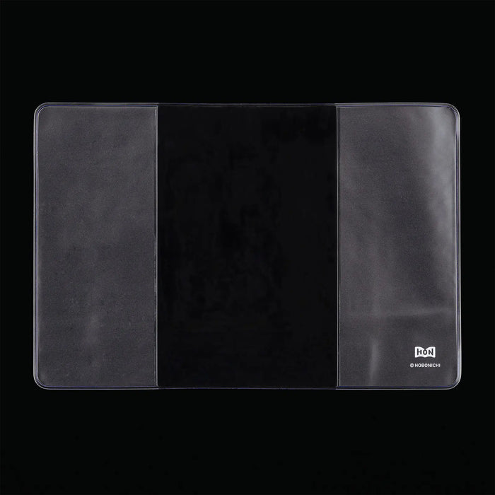 Hobonichi Techo HON A6 clear cover, open with three panels and logo