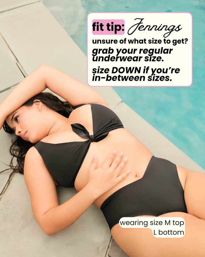 Woman in a black bikini lying by a pool with text overlay about swimwear size guidance.