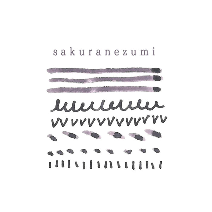 Purple ink color swatches and writing strokes on white
