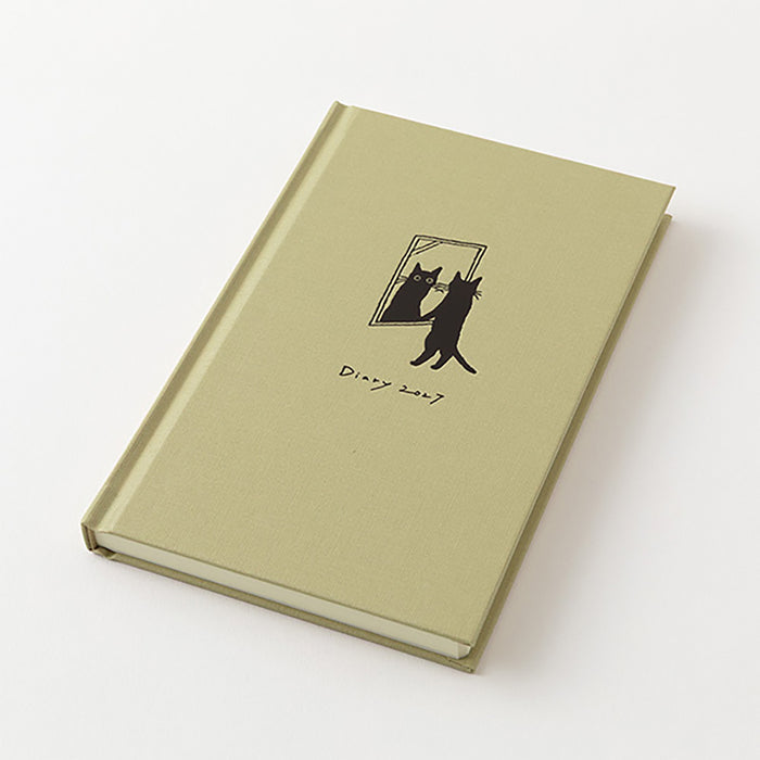 Beige B6 diary planner with black cat cover illustration, closed