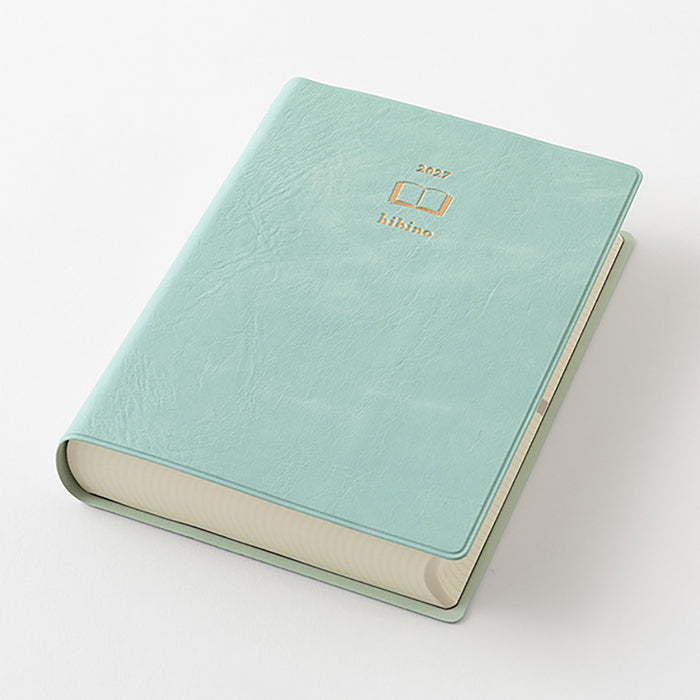 Blue-green A6 two-page-a-day planner angled cover with gold Hibino logo