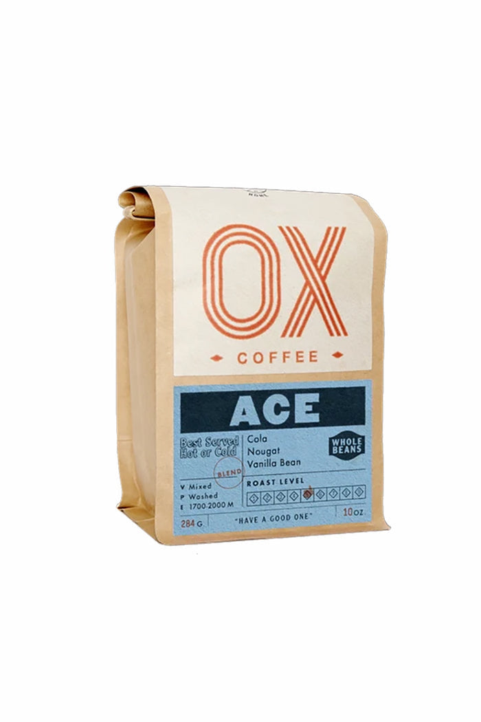 Whole bean coffee bag by OX Coffee, ACE blend, kraft paper pouch with orange logo