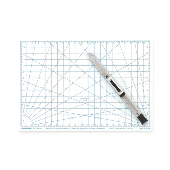White A5 cutting mat with printed grid and ruler scale