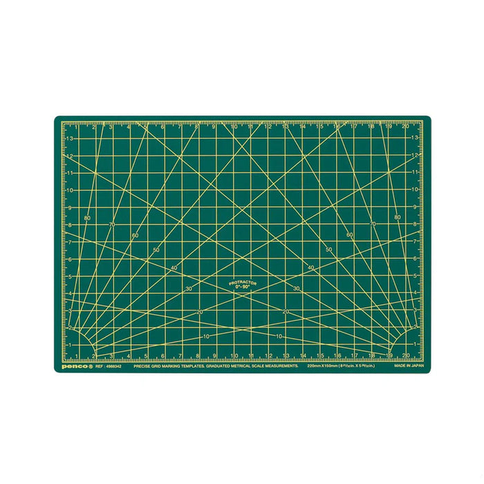 Green A5 cutting mat with diagonal grid and inch marks