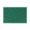 Green A5 cutting mat with diagonal grid and inch marks