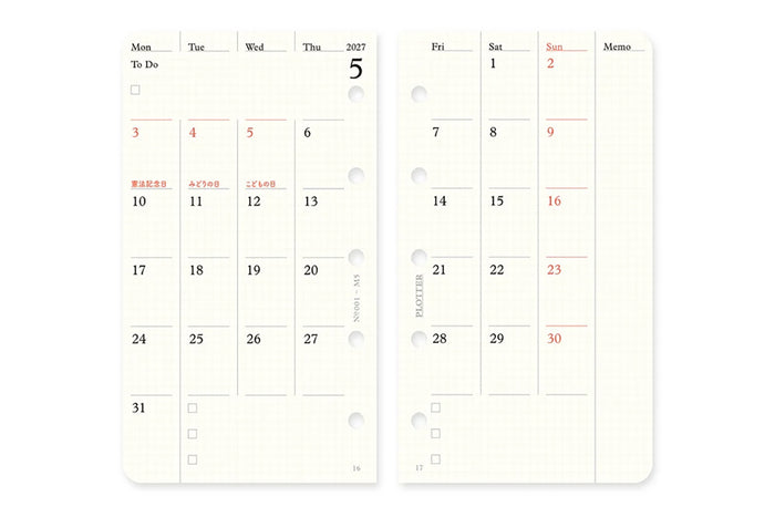 Monthly schedule refill open spread with weekday columns, red highlights, and memo section.
