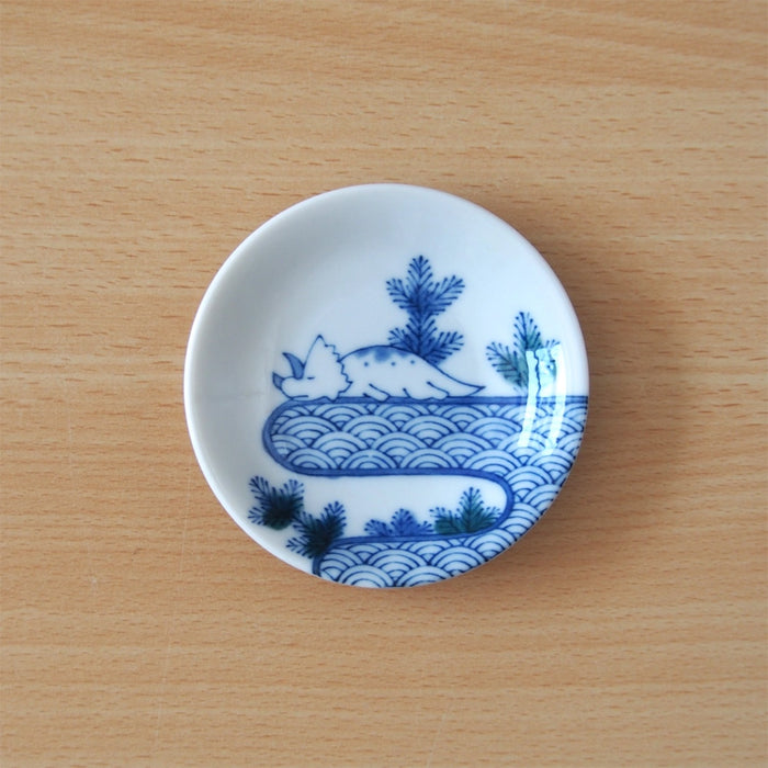 Small ceramic mini plate with blue wave seigaiha and sleeping dino illustration