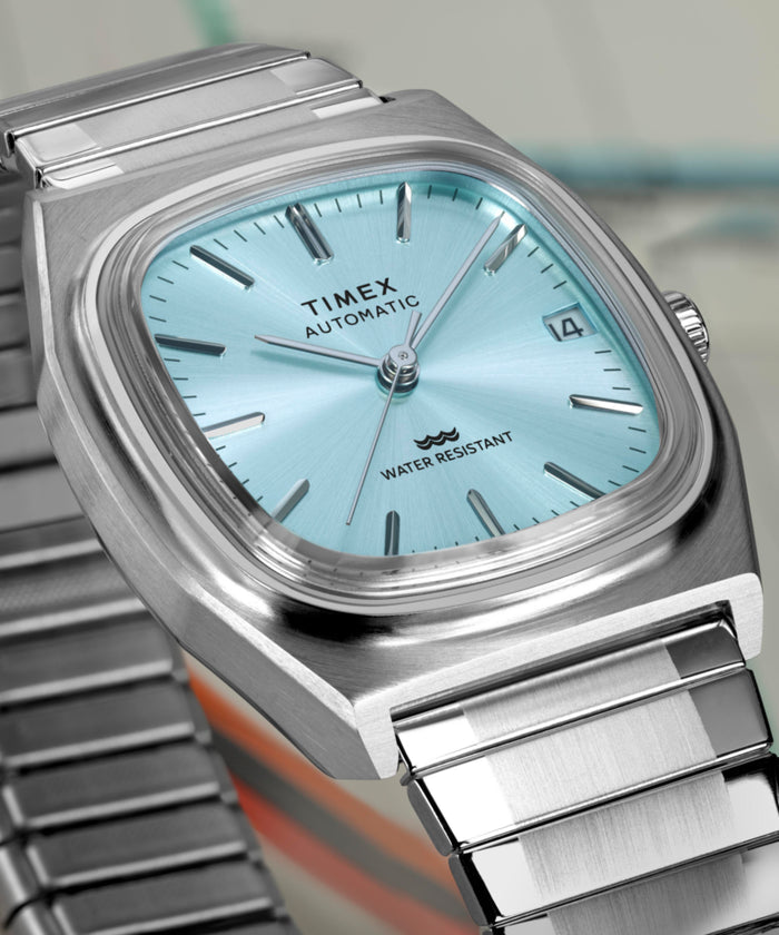 TW2Y66700 Timex® Automatic 1983 E Line 34mm Stainless Steel Expansion Band Watch Campaign Key Silhouettes (Beauty shots) Image