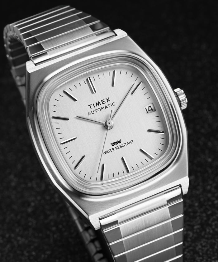 TW2W70800 Timex® Automatic 1983 E Line Reissue 34mm Stainless Steel Expansion Band Watch  Campaign Key Silhouettes (Beauty shots) Image