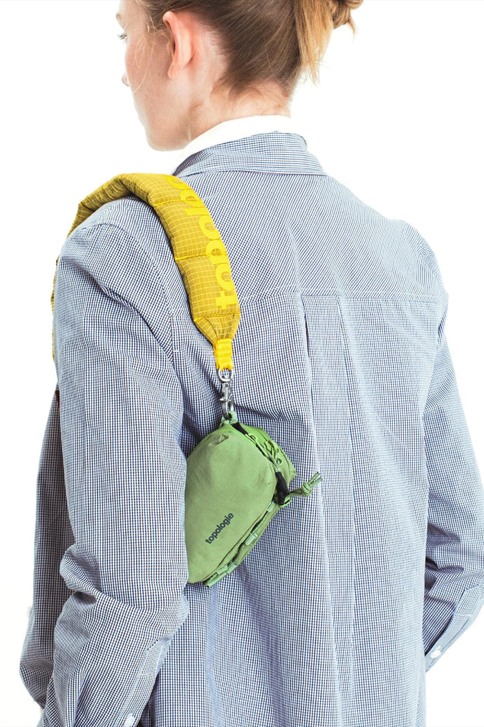 Mini crossbody bag, green body with yellow strap and zipper pocket