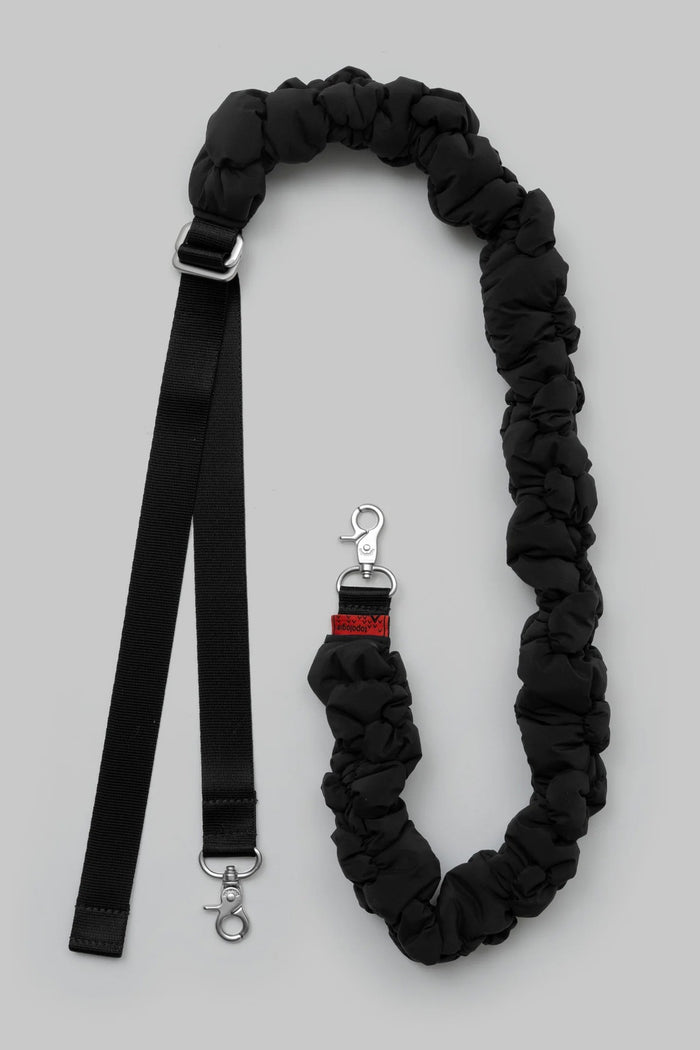 Braided dark strap with metal clips and adjustable belt ends